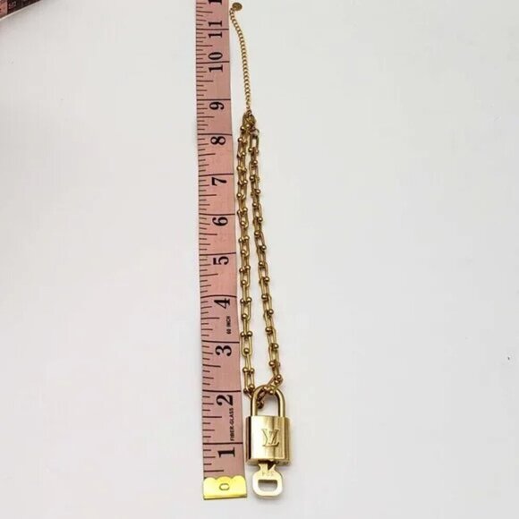 Authentic Louis Vuitton Lock and Key Gold Color with Gold Plated Chain Necklace - Picture 6 of 8